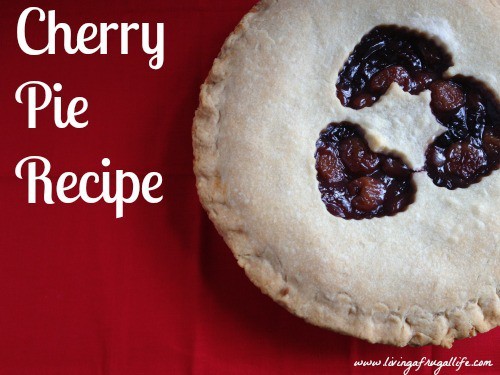 cherry pie with heart cut outs in the crust. The pie is on a red background with Cherry Pie Recipe written on it.