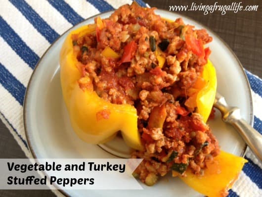 Make these really healthy vegetable and turkey stuffed peppers recipe. They are made with zucchini, peppers, and ground turkey in a pepper shell.