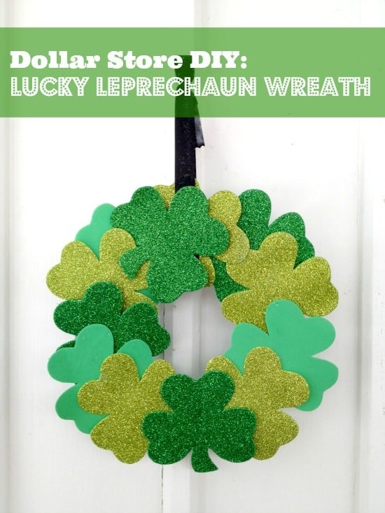 Shamrock wreath hanging on door with black ribbon with text overlay that says dollar store DIY St patricks day wreath craft.