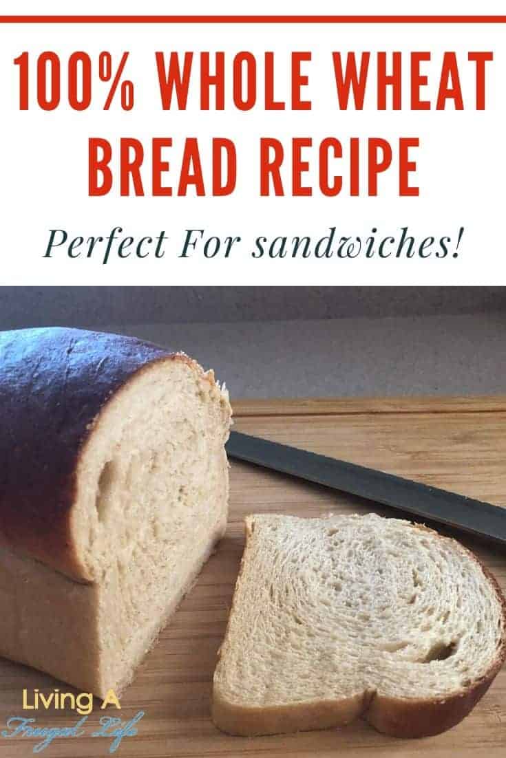 Loaf of bread with a slice cut off it. The knife is sitting next to the loaf. There is a text overlay that says 100% whole wheat bread recipe: perfect for sandwiches at the top.