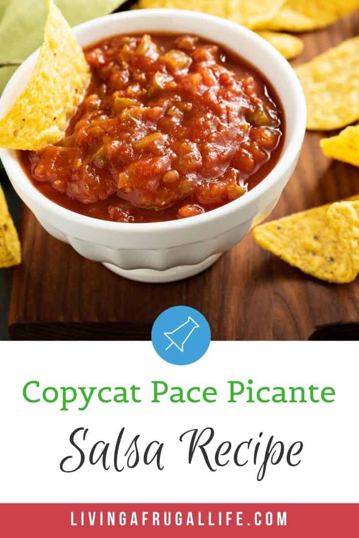 Small bowl of copycat pace picante salsa recipe with chips around the bowl and one chip scooping in the bowl. Includes a text overlay that says copycat pace picante salsa recipe 