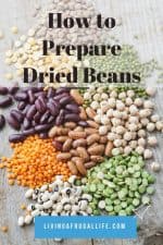 Piles of different dried beans on a table with a text overlay that says how to prepare dried beans