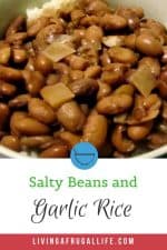 Close up picture of salty beans and garlic rice in a cream colored bowl. There is a text overlay that lasy Salty Beans and Garlic Rice at the bottom.