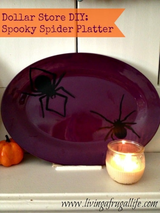 Picture of a fun halloween craft of a Spider Platter craft for the home the is a purple plate with black spiders glued on.