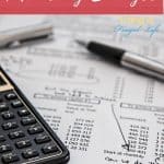calculator on a printed out budget with a pen on top. Text overlayed that says "How to Make a Monthly Budget: a beginners guide"