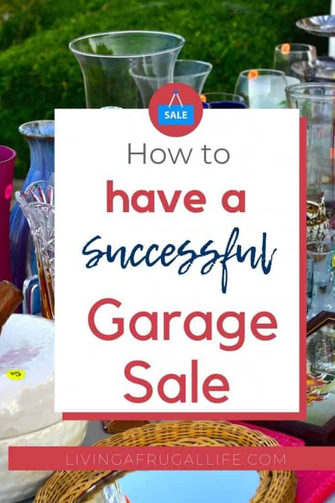 articles of clothing and dishes on a table. there is a text overlay on a white square that says how to have a successful garage sale.